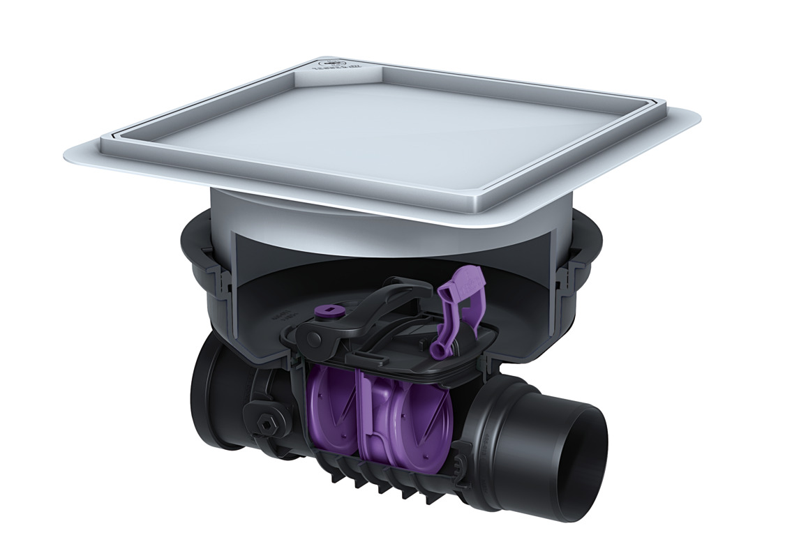 Staufix backwater valve with two flaps for installation in a concrete floor.
