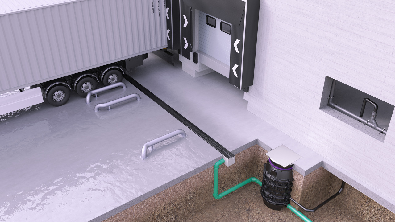 Installation proposal for a hybrid lifting station in the loading bay Illustration of a loading bay with a lorry, a drainage channel and pipework leading into a hybrid lifting station.