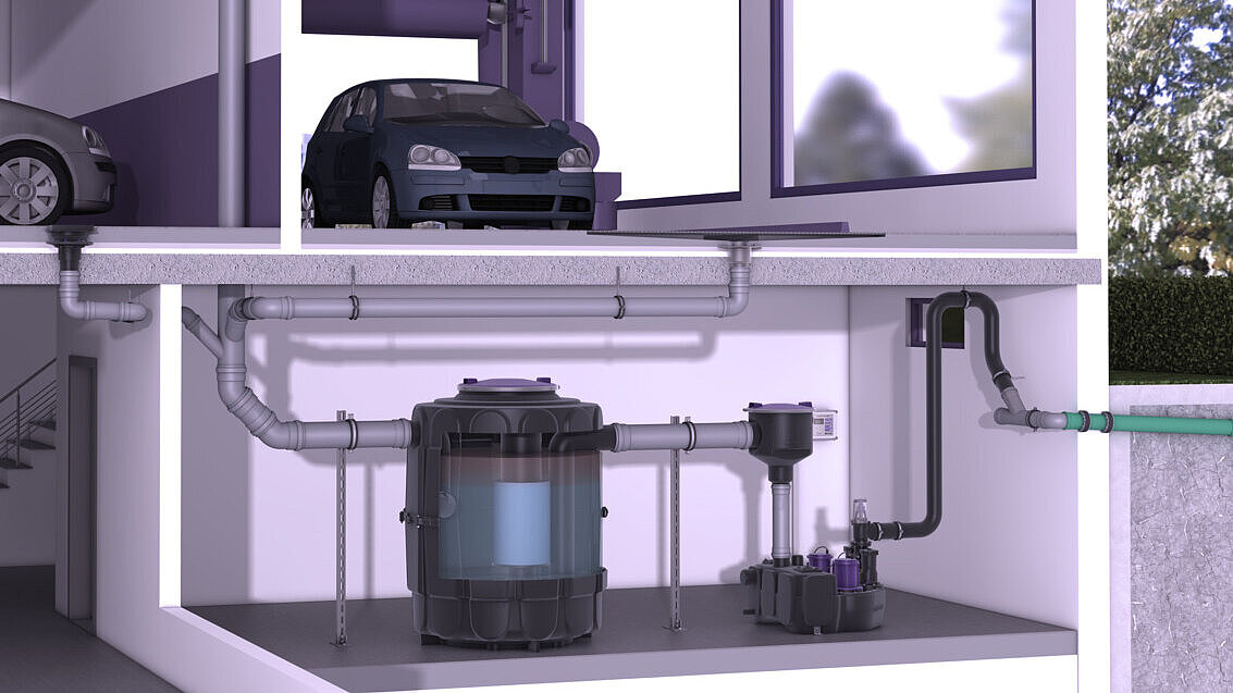 Oil/fuel separator installed as a exposed installation in a multi-storey car park with vehicle washing area.