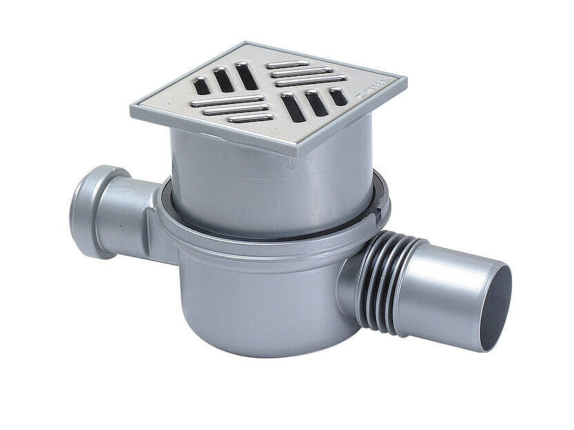 The Superflat bathroom drain with a slotted cover upper section The Superflat bathroom drain with a slotted cover upper section