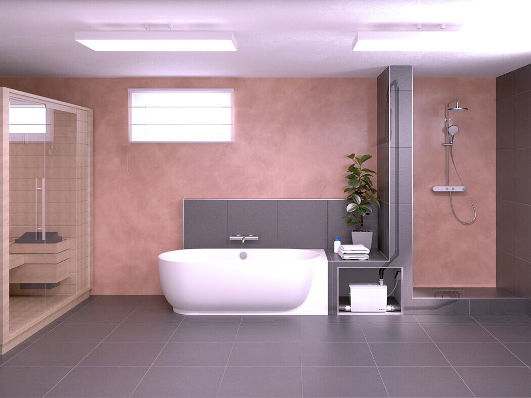 Basement room with a sauna, bath and shower. The drainage outlets are connected to a small lifting station.
